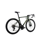A carbon fiber road bicycle with a dark green and black camouflage pattern frame, black wheels, and black components, shown from a side profile on a light gray background.