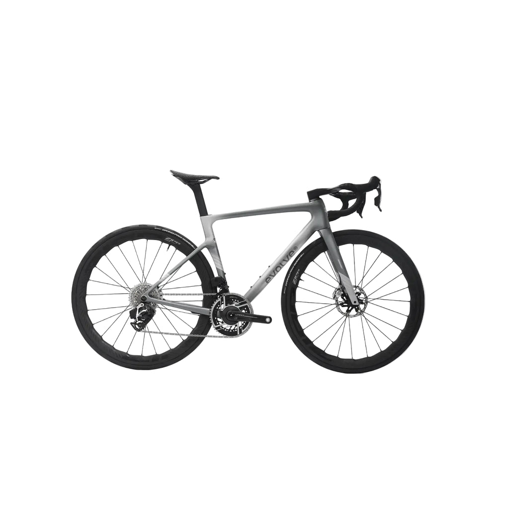 A road bicycle with a matte gray frame and black components, including the wheels, tires, saddle, and handlebars, shown against a light gray background.