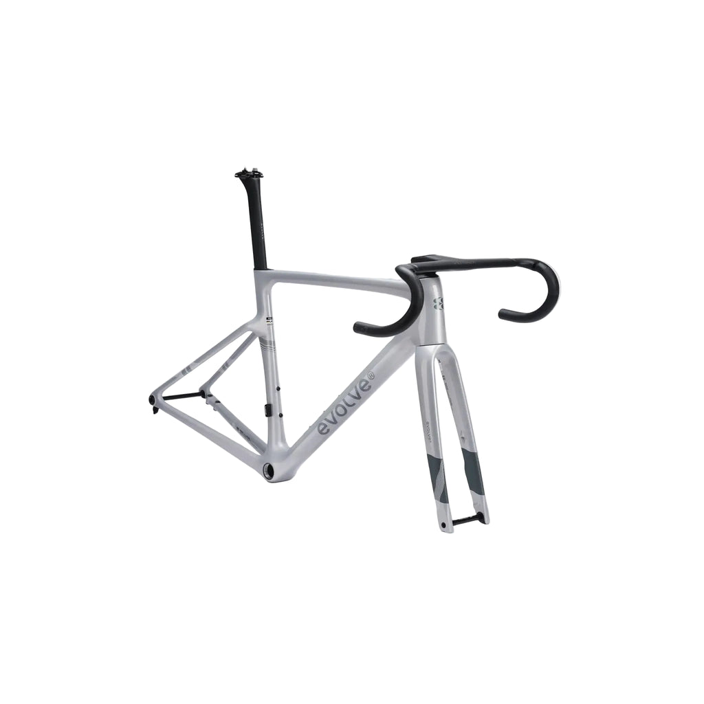 A road bicycle frame in a light gray finish with black drop handlebars, black seat post, and black fork accents, displayed on a clean light gray background. The brand name 'evolve' is printed on the down tube.