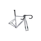 A road bicycle frame in a light gray finish with black drop handlebars, black seat post, and black fork accents, displayed on a clean light gray background. The brand name 'evolve' is printed on the down tube.