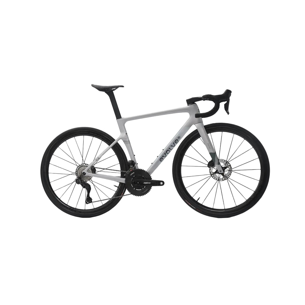 A white and black road bicycle with drop handlebars, shown from a side profile against a light gray background. The brand name 'SCIANS' is visible on the down tube.
