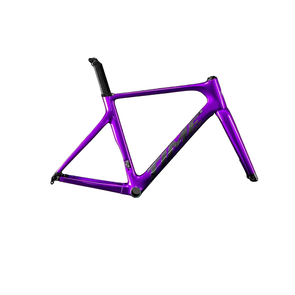 A vibrant purple bicycle frame with black components, shown against a dark gray gradient background.