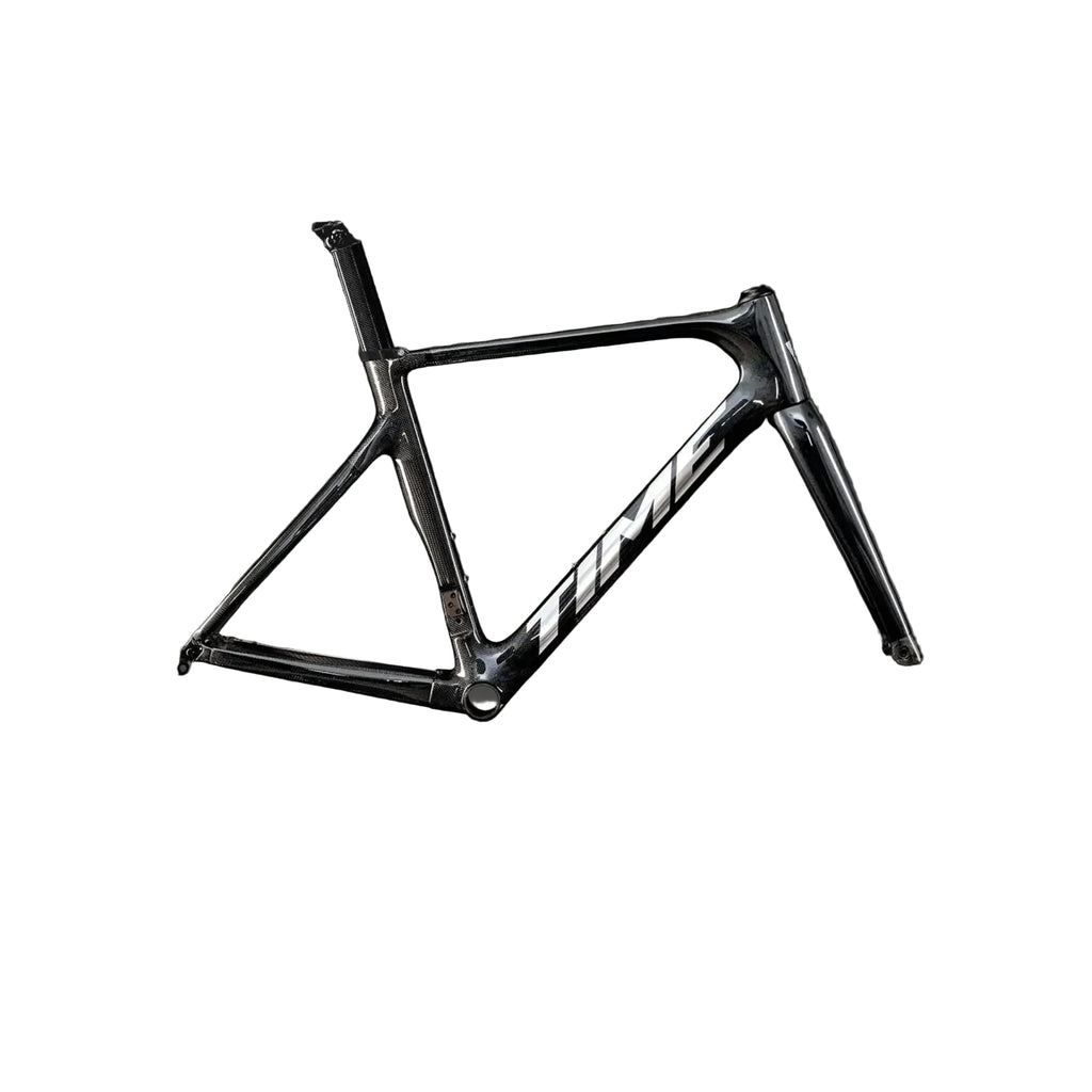 A black carbon fiber road bicycle frame with the brand name 'TIME' in white on the down tube, shown against a dark gray studio background.